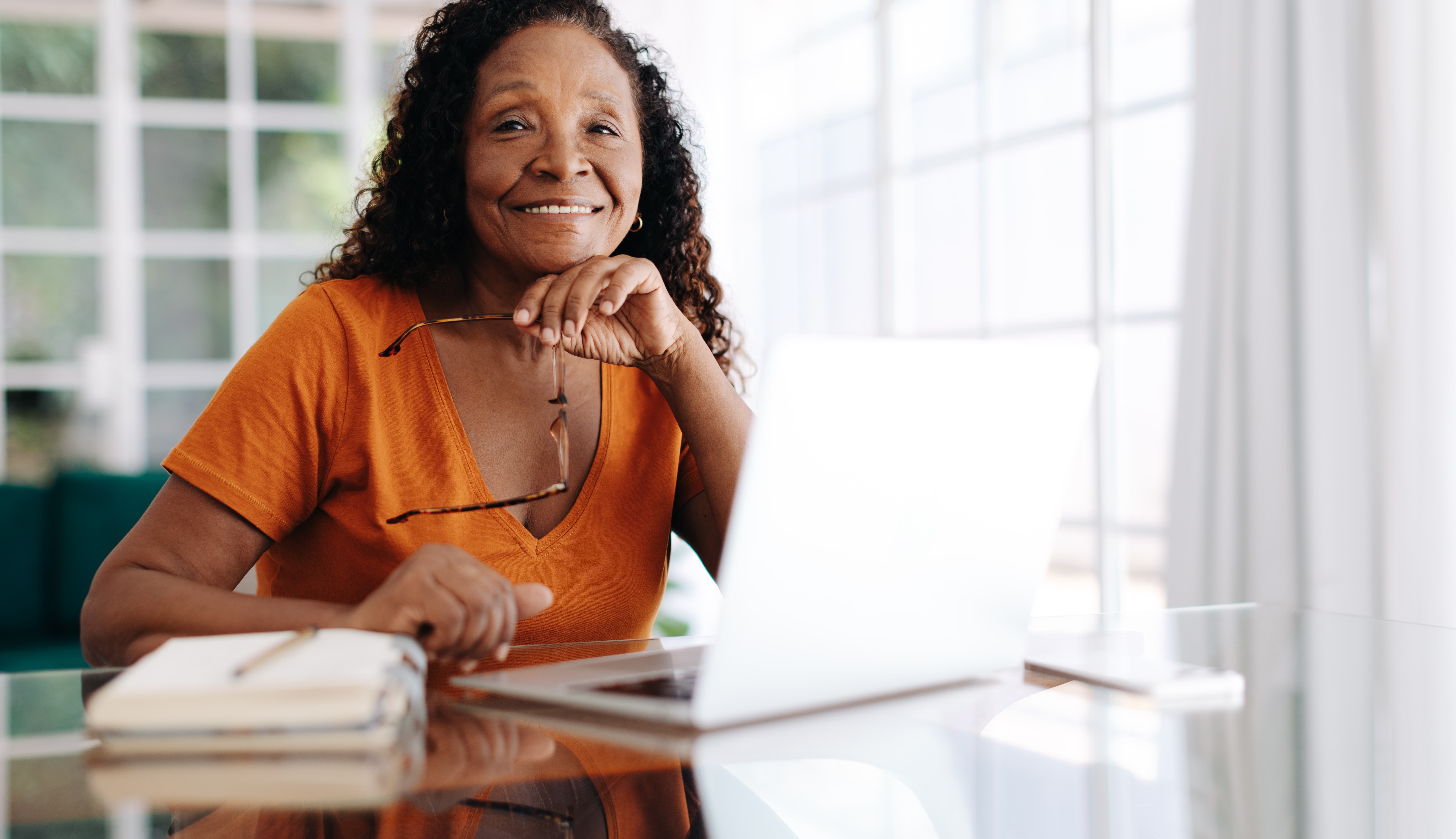 older woman avoiding financial scams confidently
