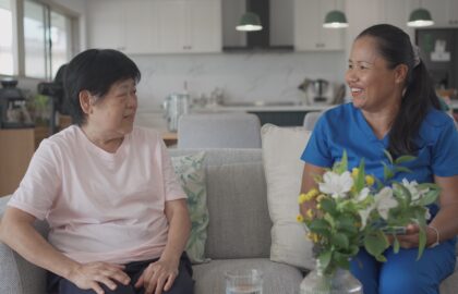 in-home caregiver with aging parent